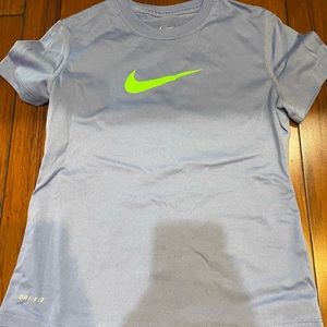 Blue shirt with green Nike logo